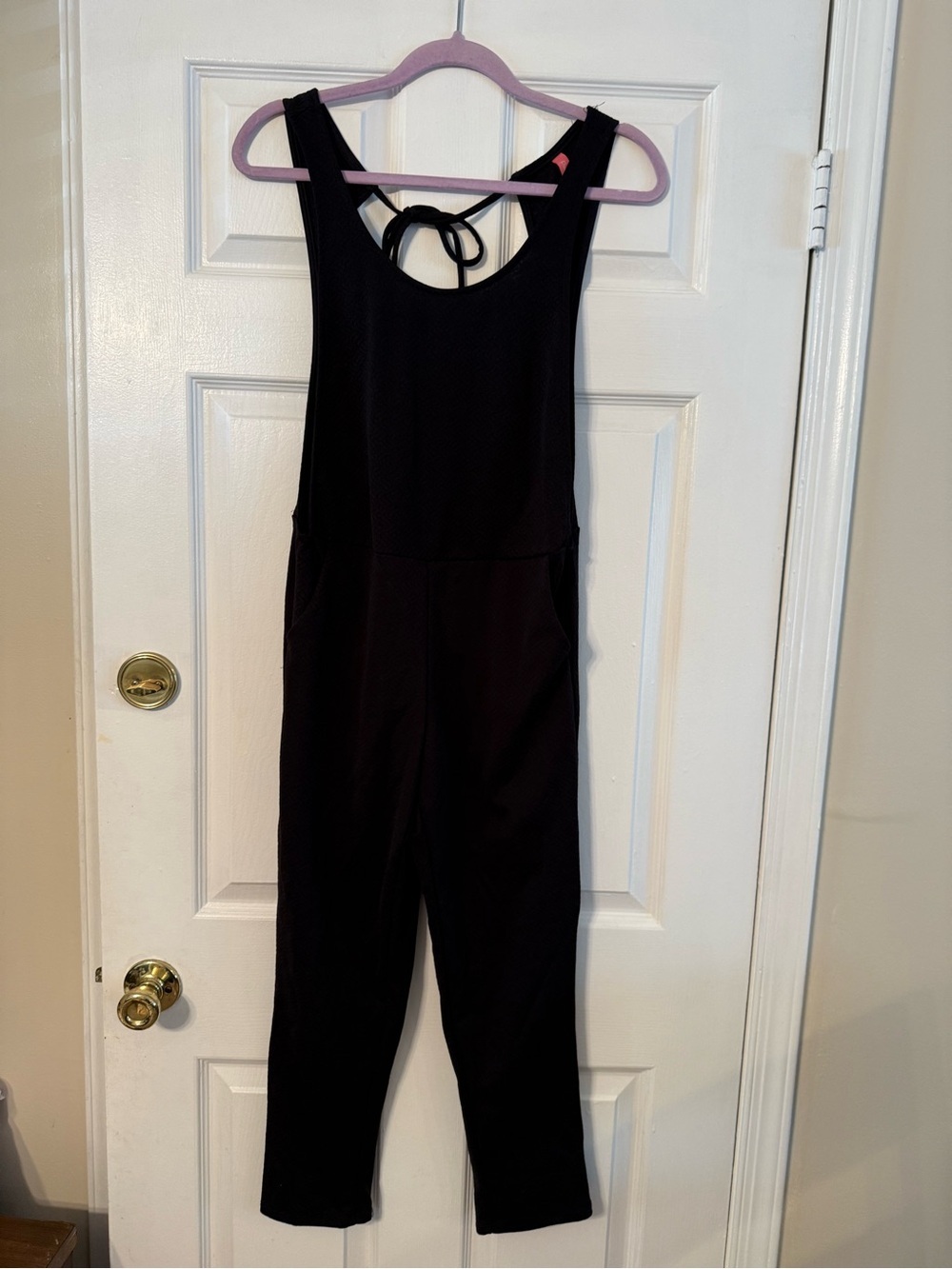 Classic Black Sleeveless Tie-Back Jumpsuit